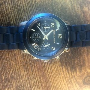 Michael Kors black and gold women’s watch